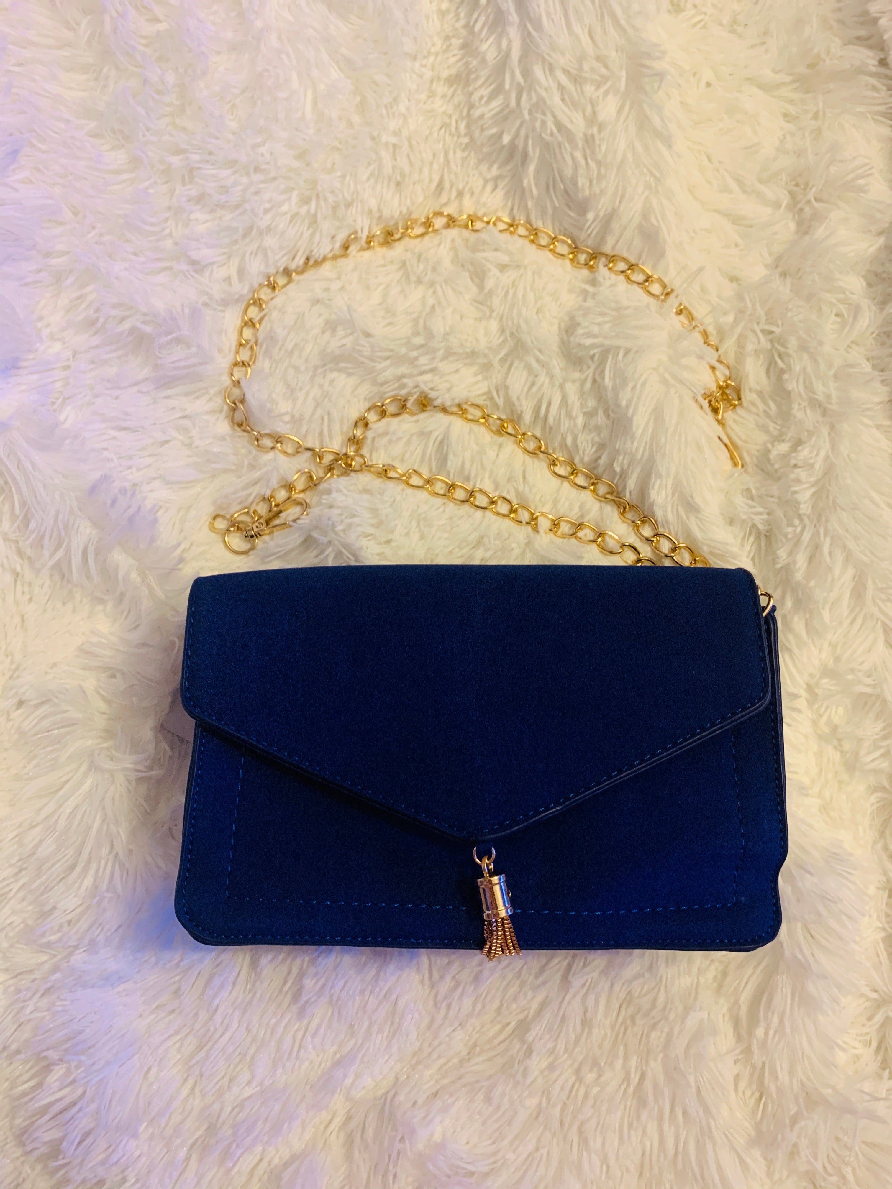 blue suede bag